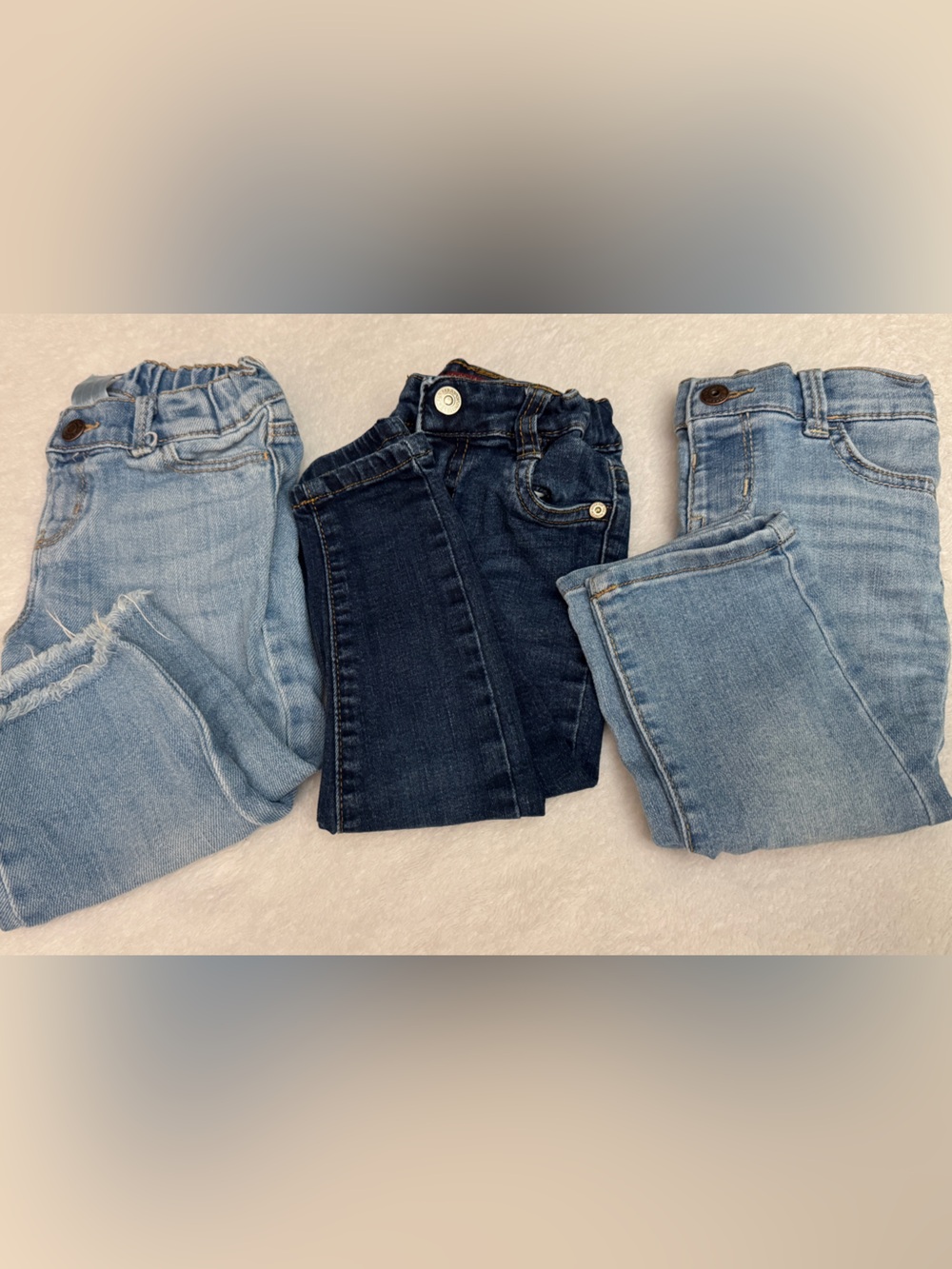Set of three pairs of jeans for a girl: